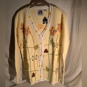 Storybook knit sweater titled “Buzzin for Sun”